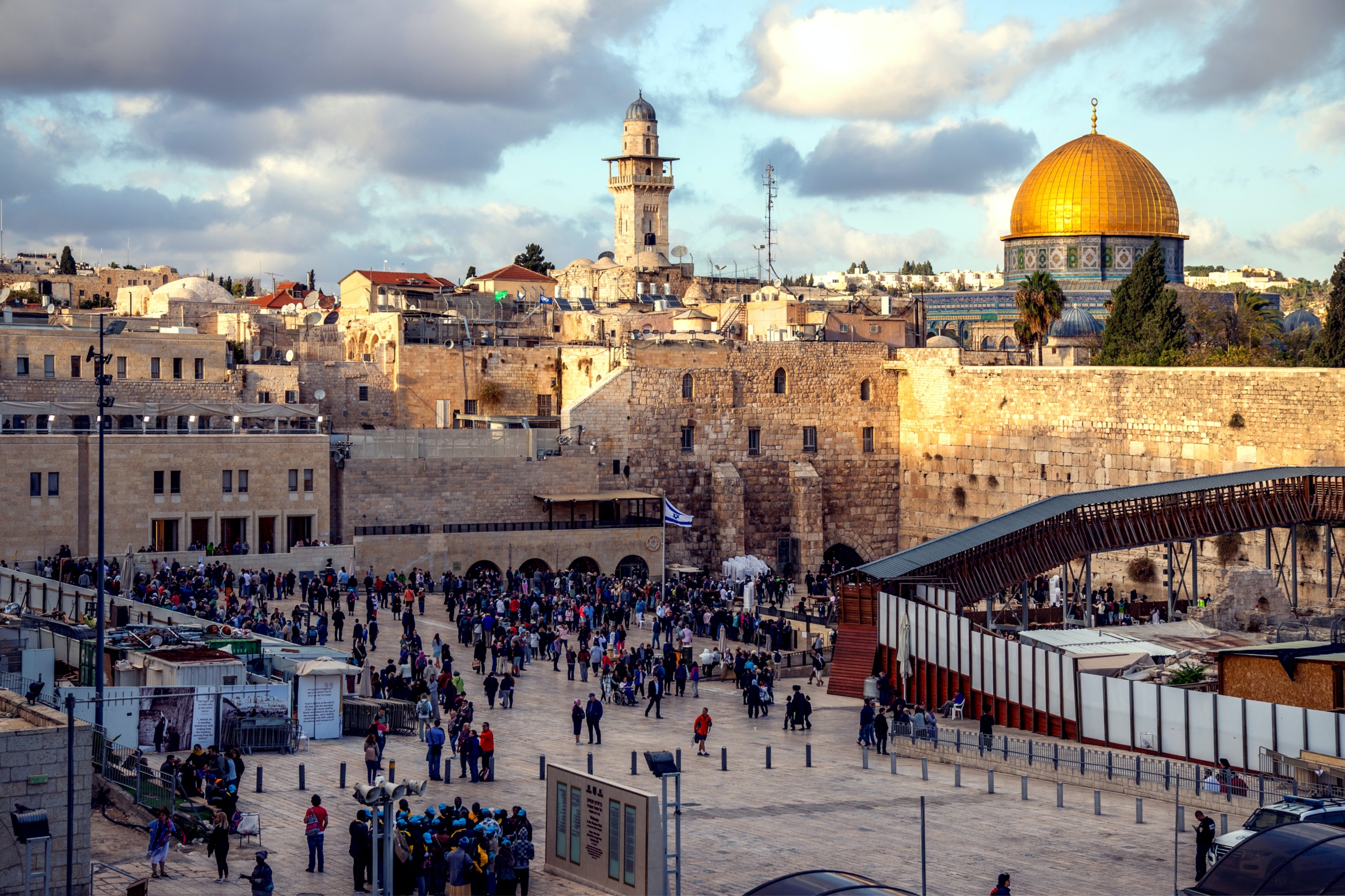 people gathered in front of concrete structures