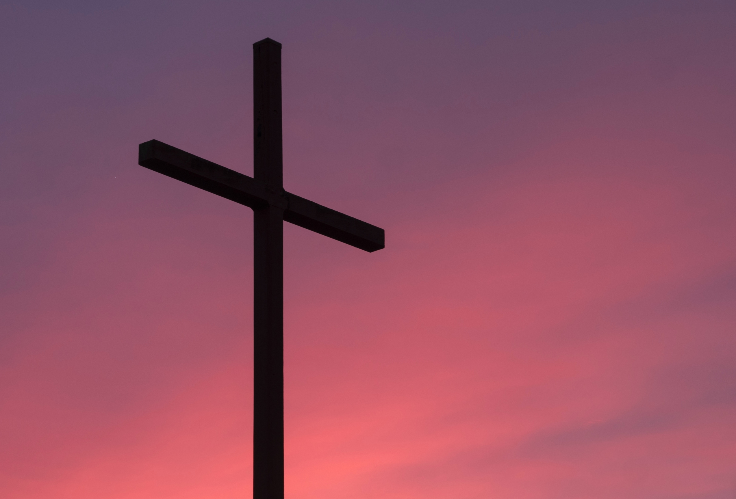 brown wooden cross during golden hour