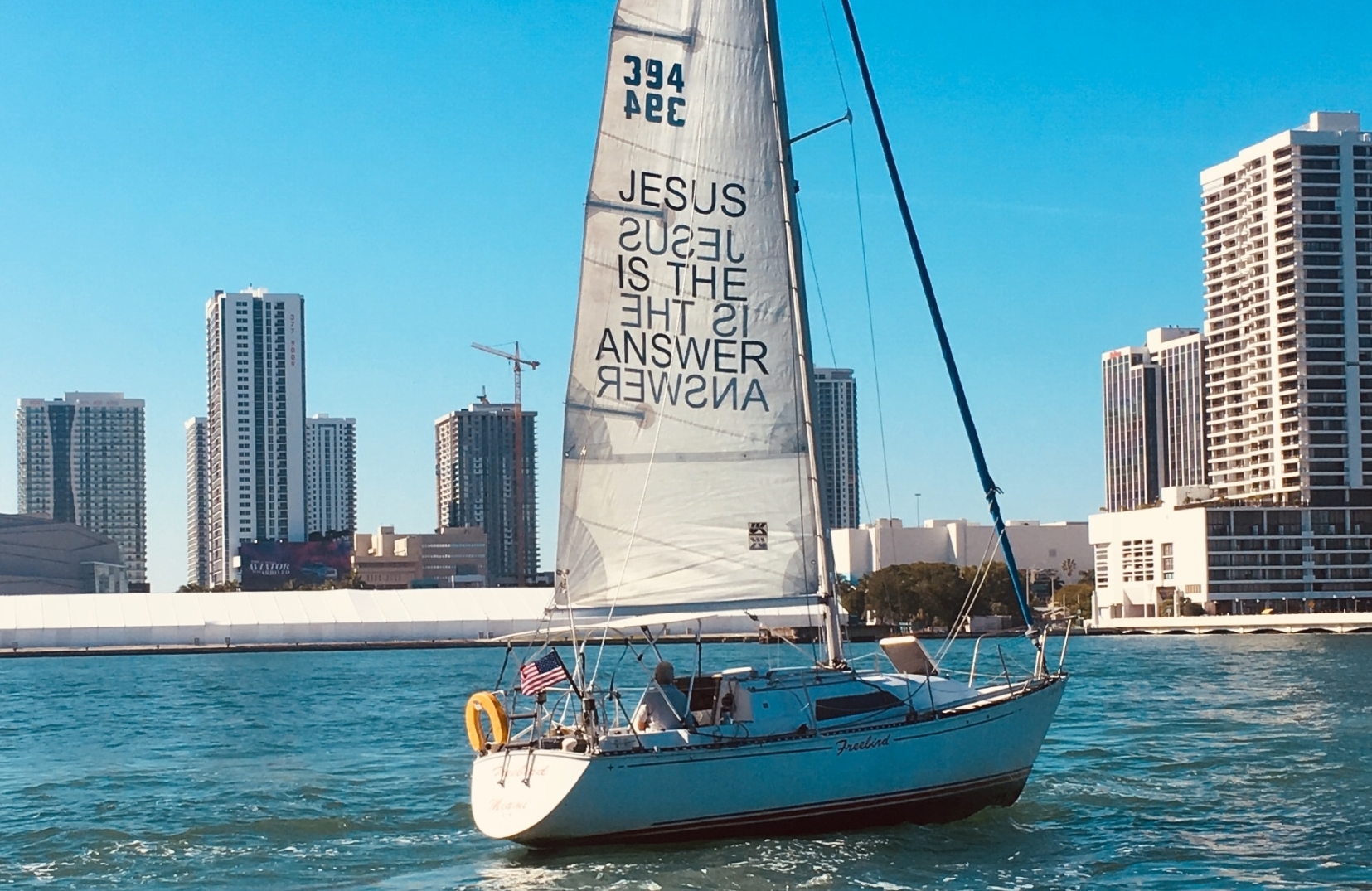 sailing white boat during daytime